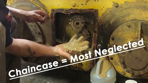 how to clean out chain case skid steer|skid steer gear box drain.